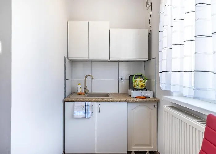 Quarto em Acomodações Particulares Goscinne U Brodzi