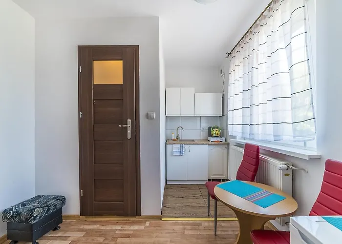 Quarto em Acomodações Particulares Goscinne U Brodzi *